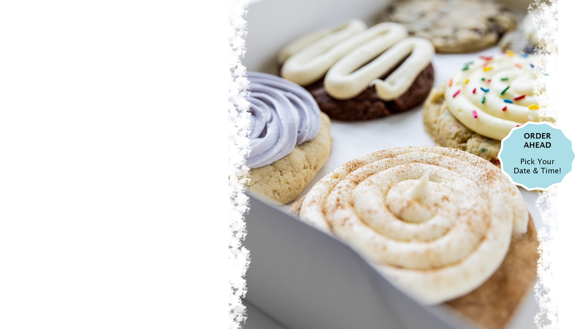 A close-up of assorted frosted cookies in a white box, including a lavender swirl cookie, a cinnamon swirl cookie dusted with powdered sugar, and a cookie with colorful sprinkles. A light blue badge on the right reads 'ORDER AHEAD Pick Your Date & Time!'.